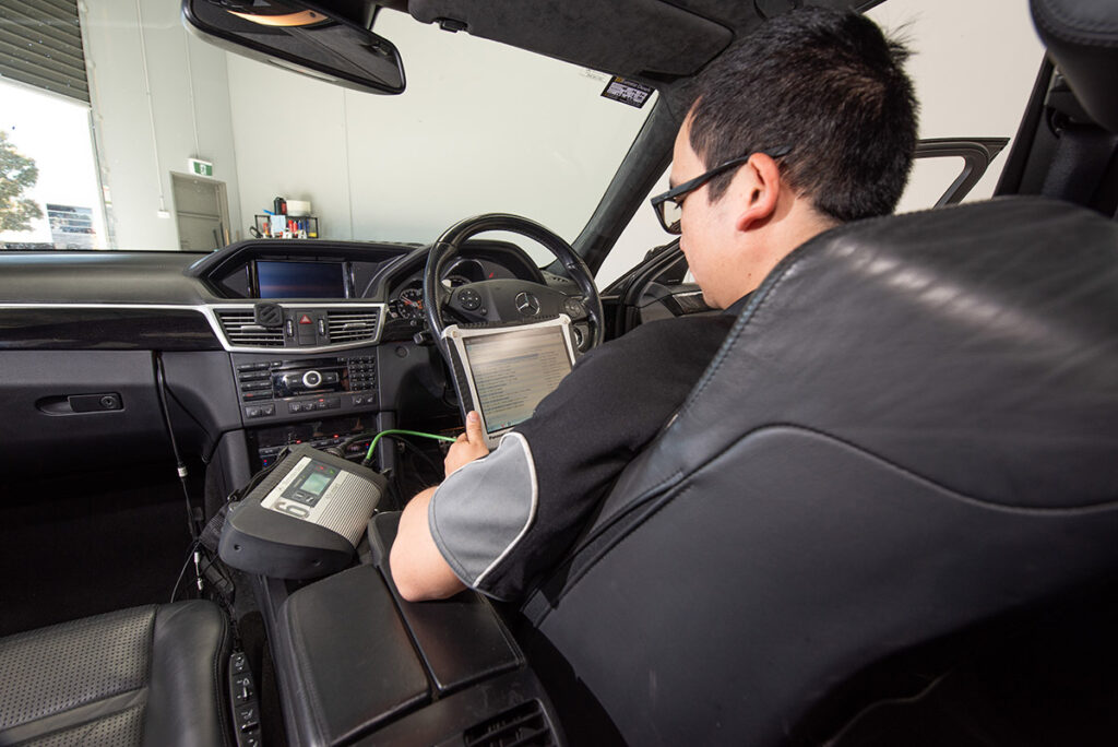 Eurostar diesels technician mechanic performing diagnostsics for mercedes srs warning light