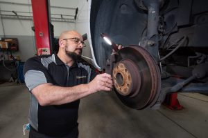 brake replacement package in progress on mercedes vito by technician using brake tools
