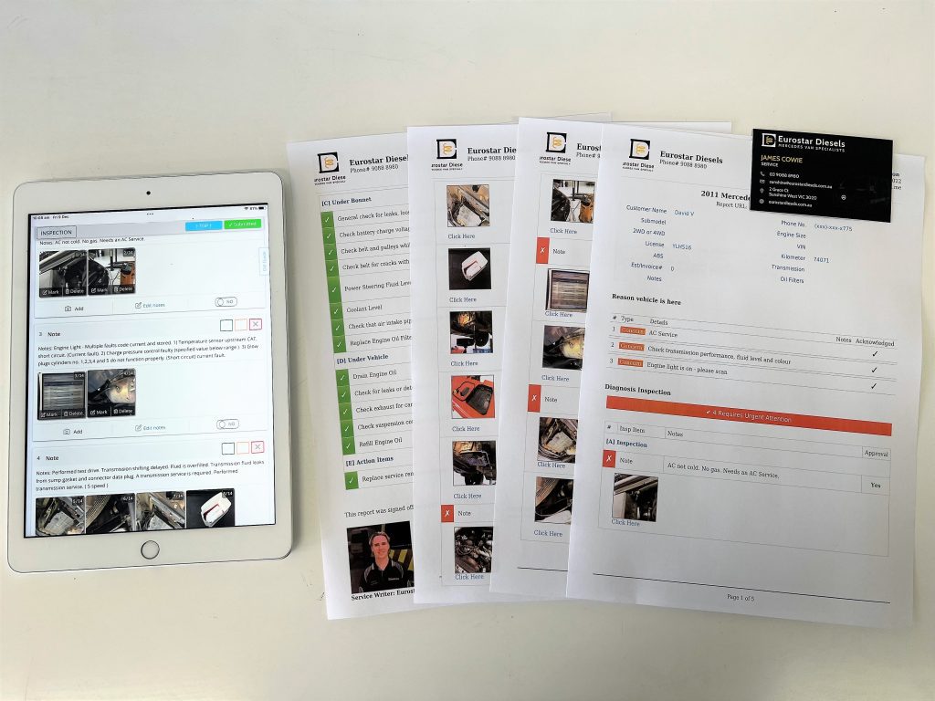 printed inspection and report laid out on table with ipad for mercedes