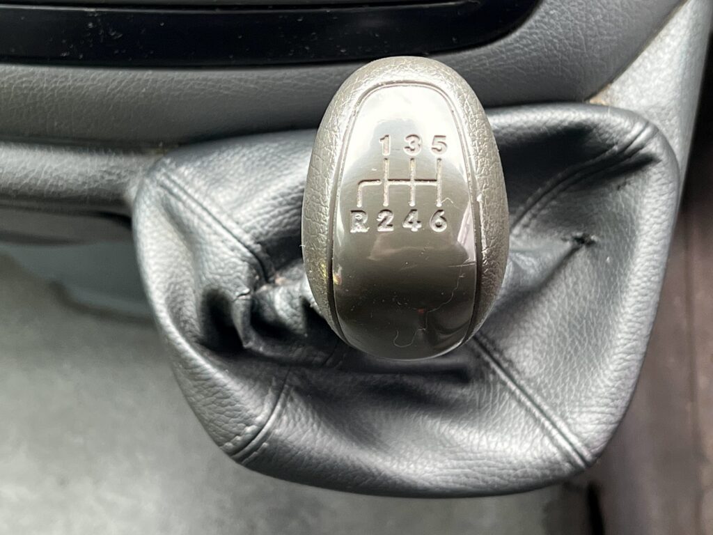 manual gearstick shown before a manual gearbox and differential service is performed