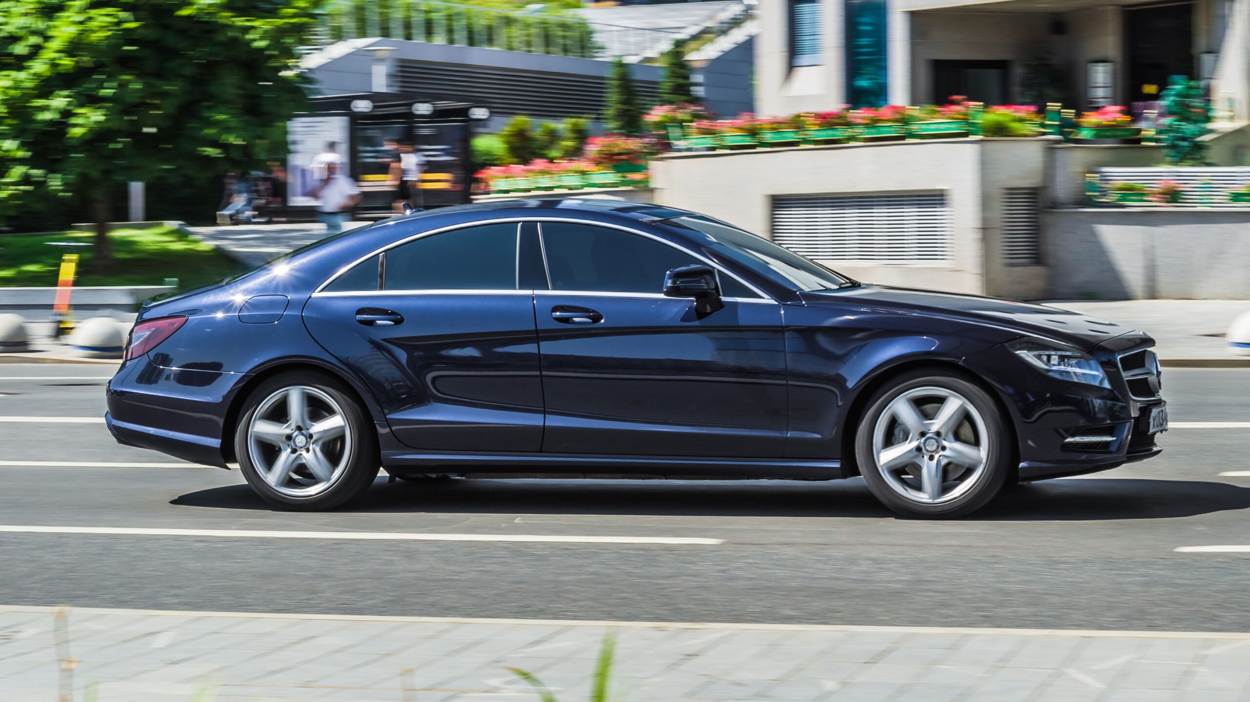 dark mercedes cls driving before service and repairs
